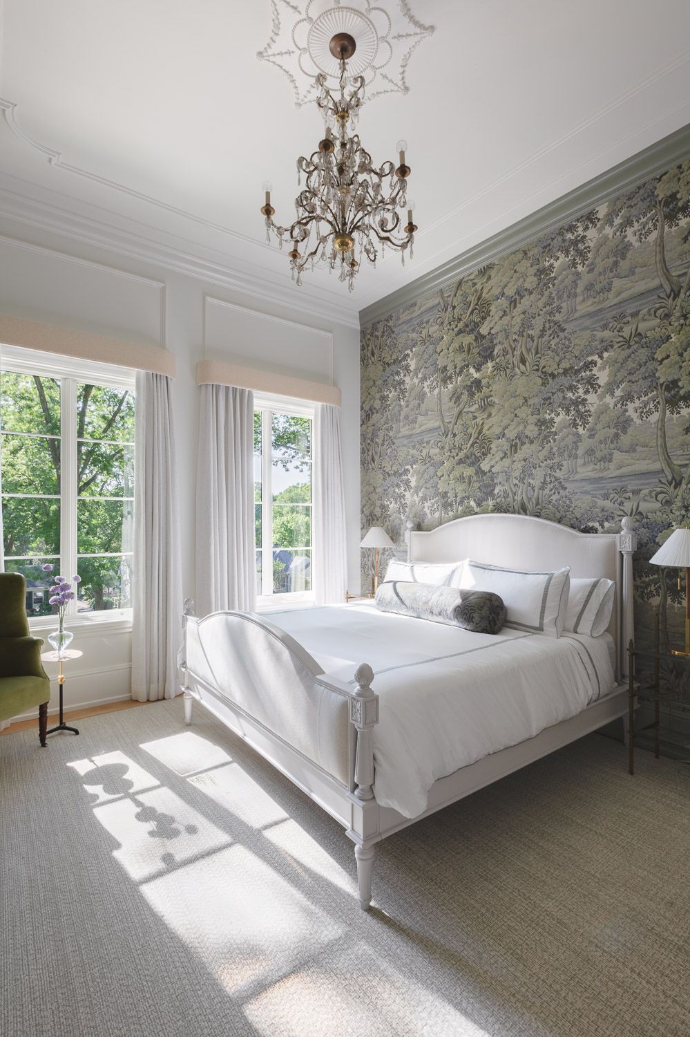 Bedroom with elegant wallpapered feature wall